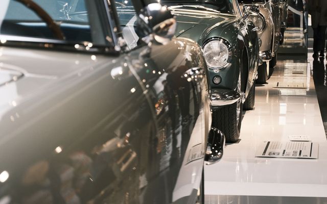 A polished showroom floor with display items under bright lighting